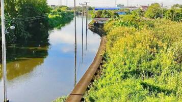 Standard Room, 1 Queen Bed, Canal View | Terrace/patio