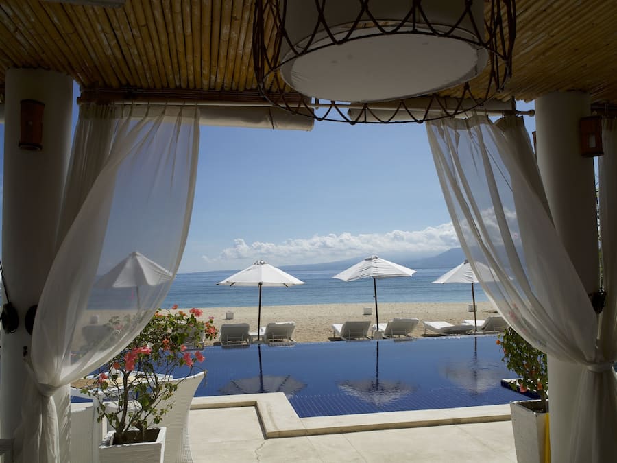 Outdoor pool, open 9:00 AM to 6:00 PM, pool umbrellas, pool loungers