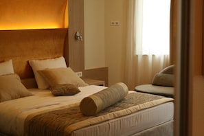 Premium bedding, minibar, in-room safe, desk