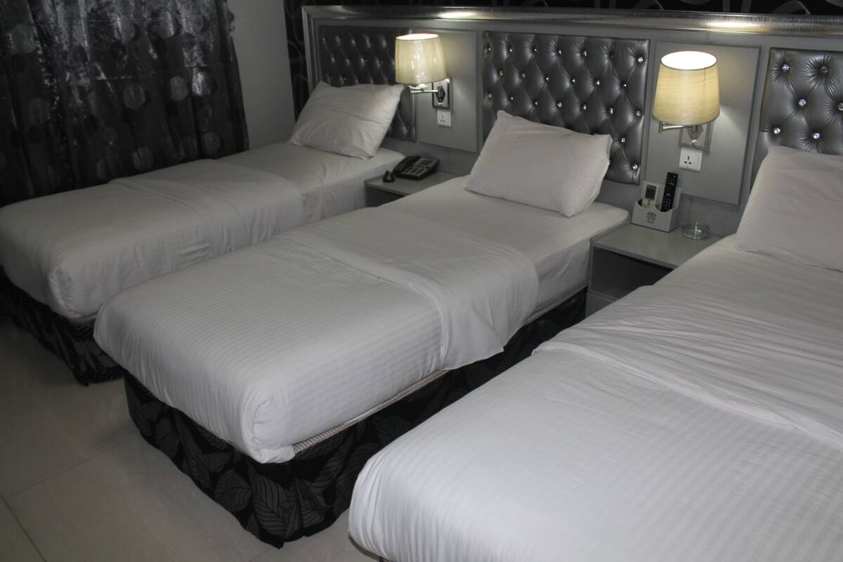 Triple Room | Minibar, in-room safe, desk, soundproofing
