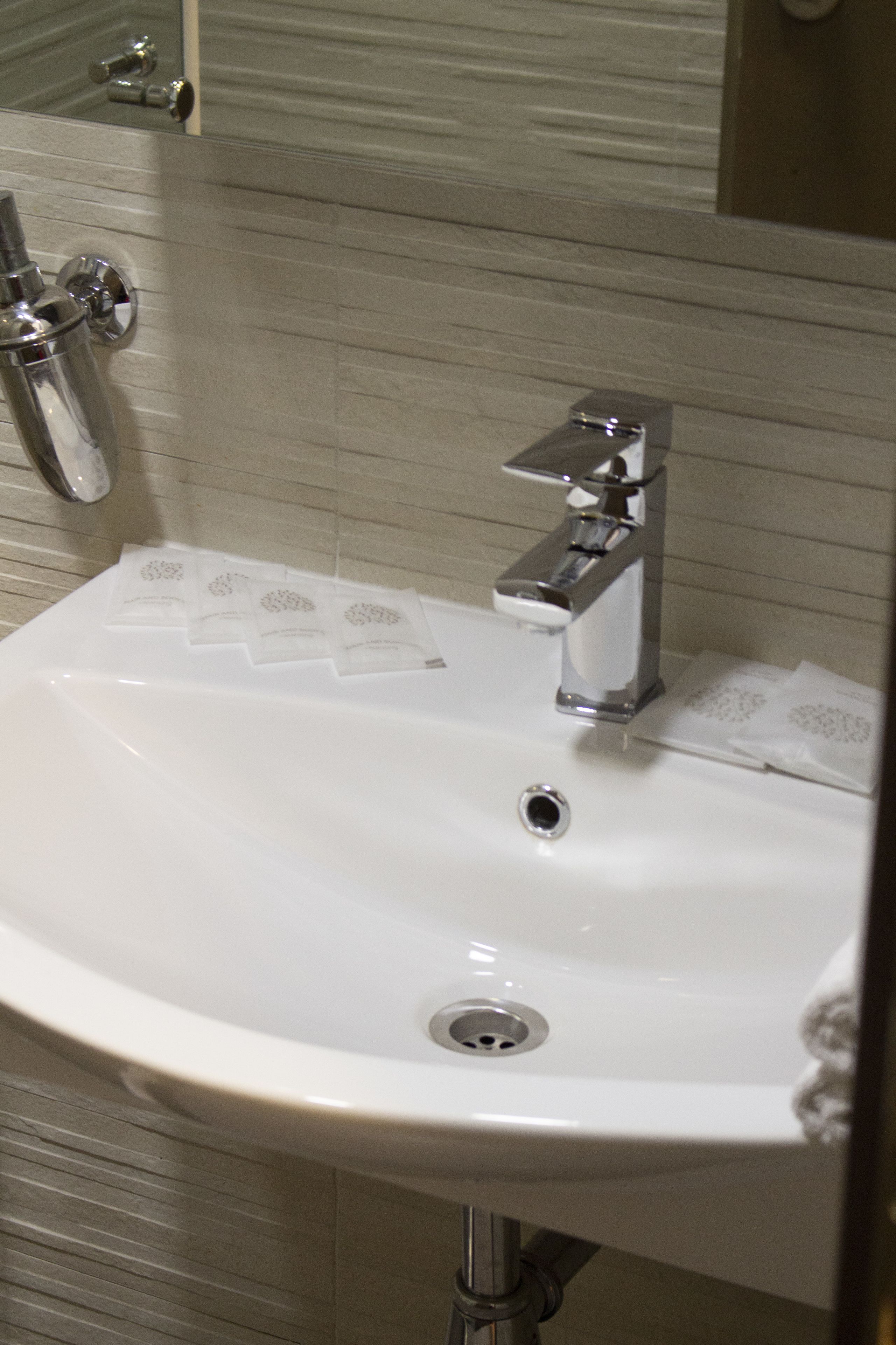standard single room | bathroom | shower, designer toiletries, hair dryer, slippers
