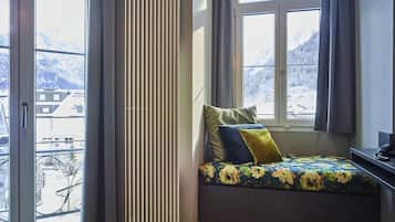 Deluxe Double Room, Mountain View (Large) | Living area | 60-inch flat-screen TV with cable channels, TV, DVD player
