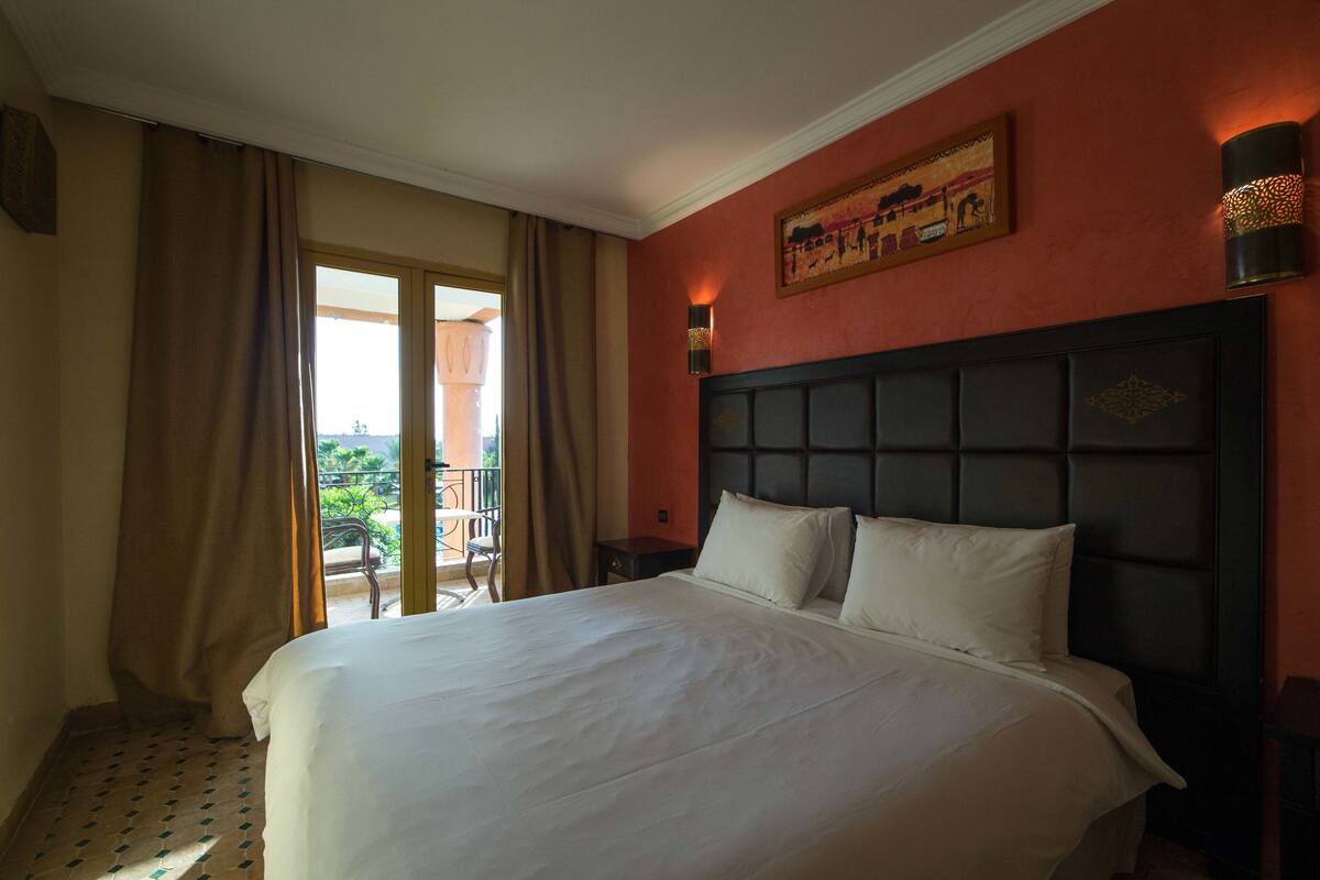 Superior Suite, 1 Bedroom, Pool View, Corner | 1 bedroom, minibar, in-room safe, desk
