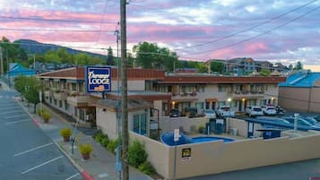Park in the designated lot and enjoy scenic views of the surrounding hills and trees.