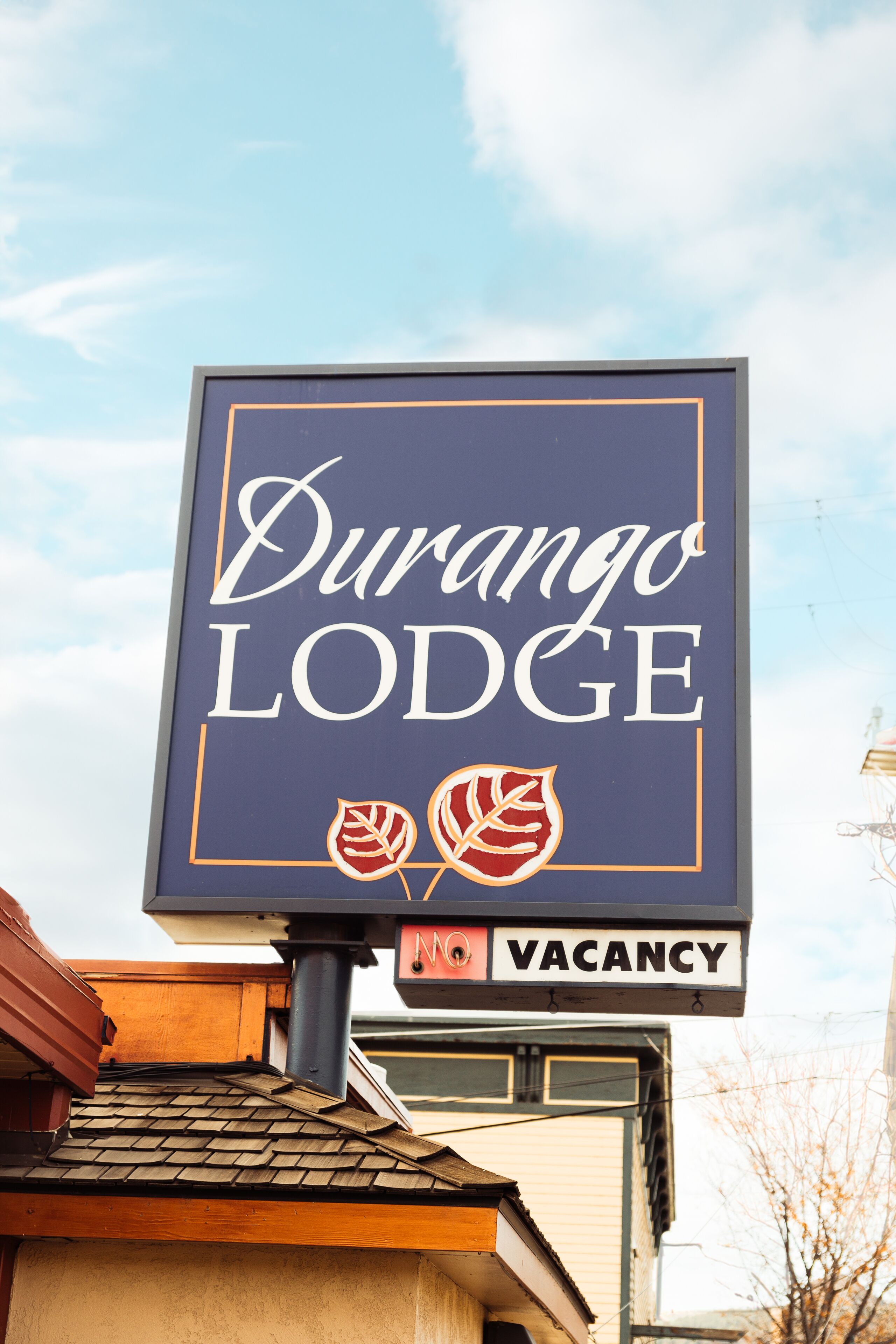 A Durango Lodge sign with a vacancy notice.