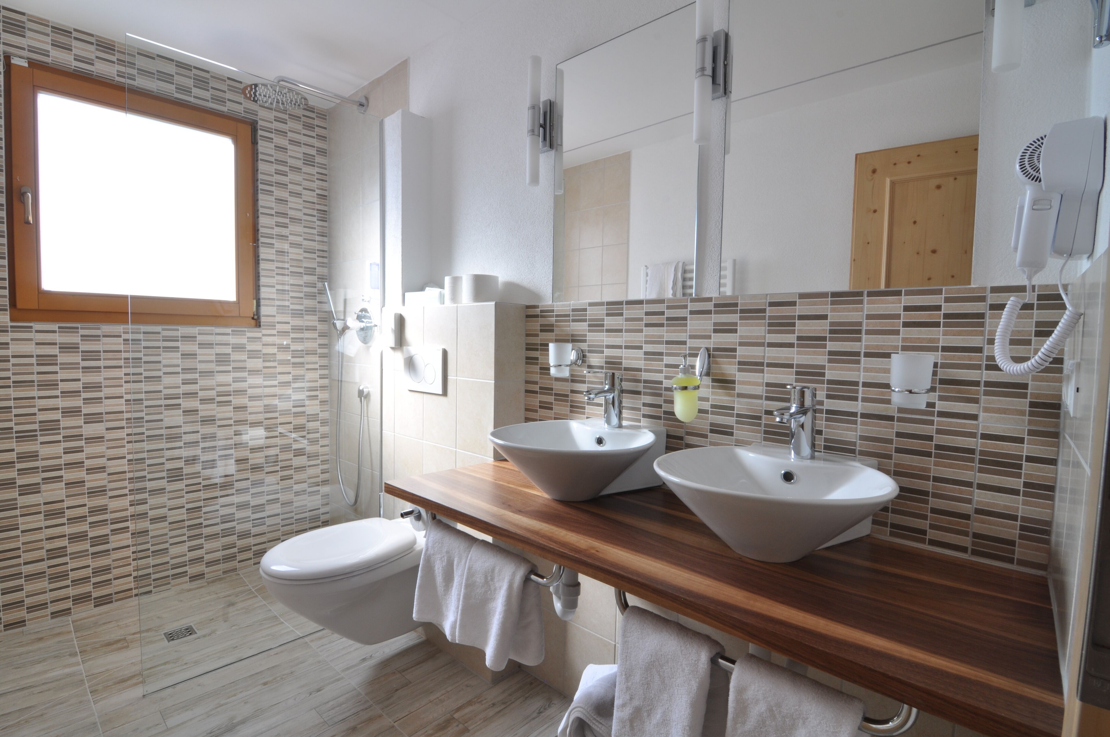 quadruple room | bathroom | shower, rainfall showerhead, free toiletries, hair dryer