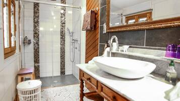 Honeymoon Apartment, 1 Bedroom, City View | Bathroom | Shower, free toiletries, hair dryer, towels