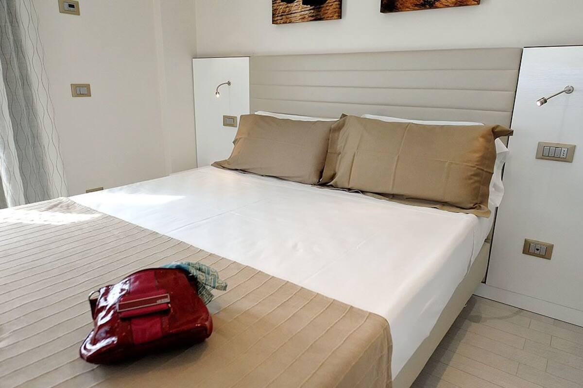 Suite, 1 Bedroom, Partial Sea View | Minibar, in-room safe, desk, soundproofing