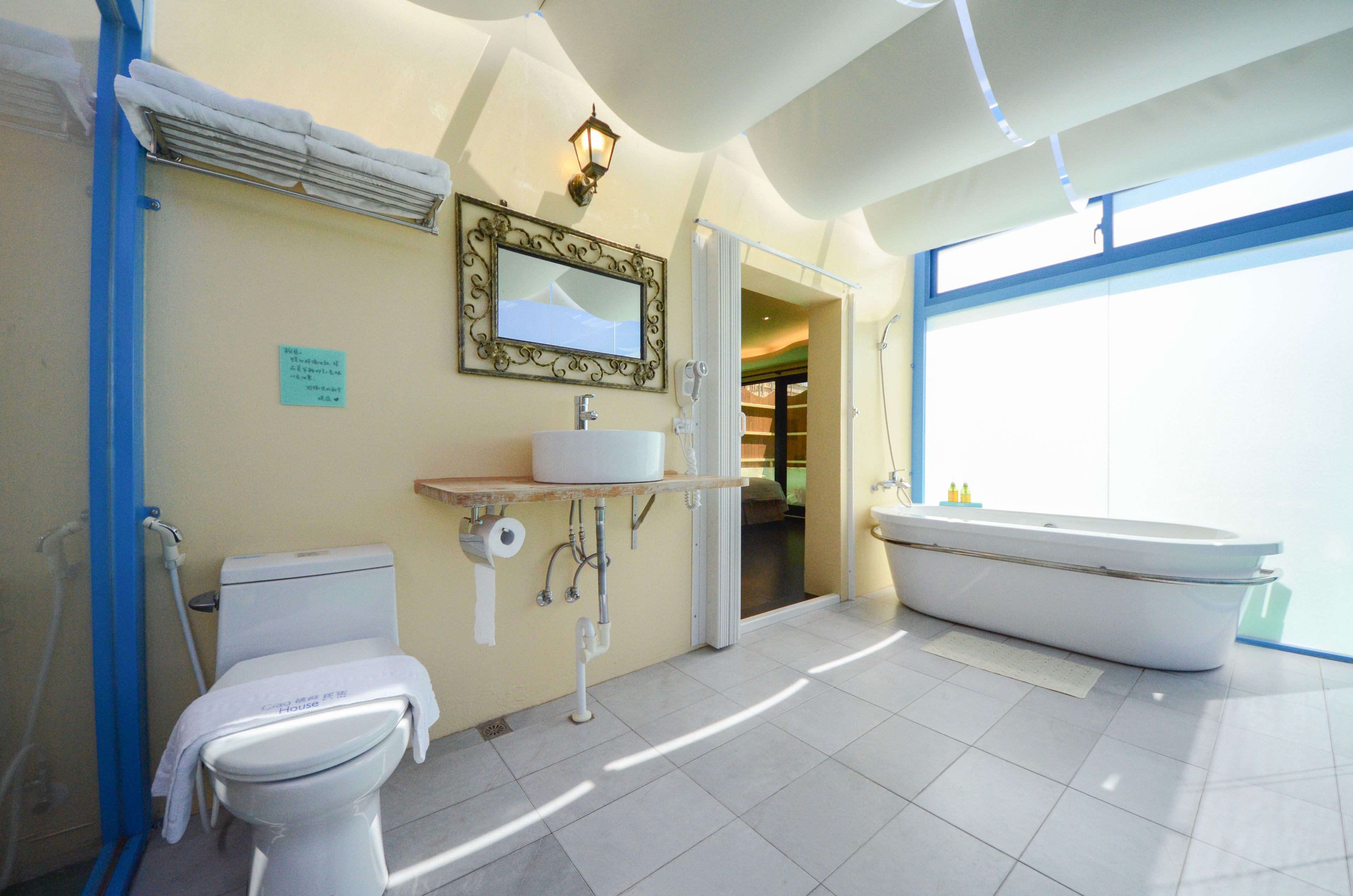 exclusive quadruple room | bathroom amenities | free toiletries, hair dryer, slippers, bidet