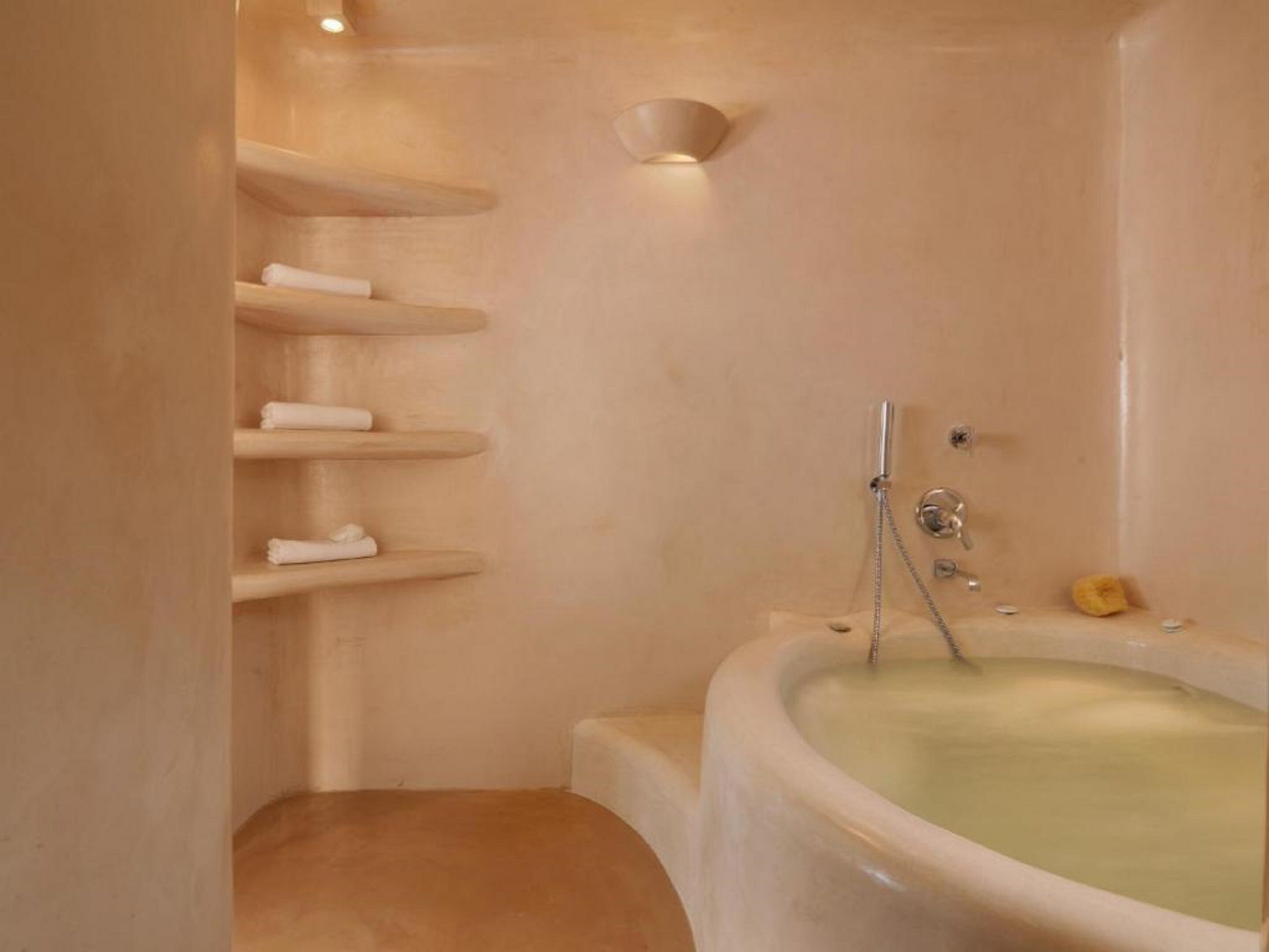 suite, jetted tub | bathroom | free toiletries, hair dryer, bathrobes, slippers