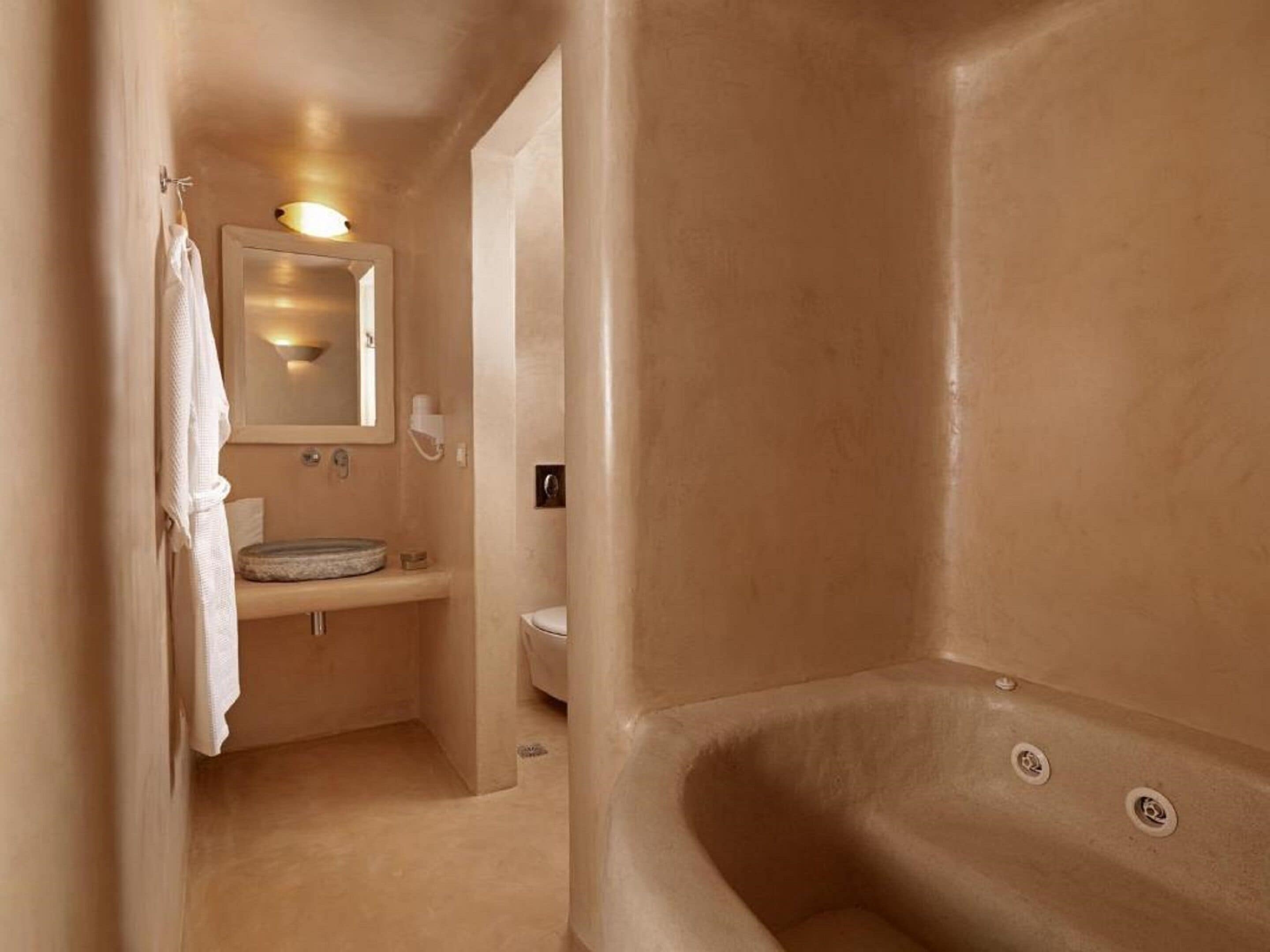 honeymoon suite, jetted tub | bathroom | free toiletries, hair dryer, bathrobes, slippers