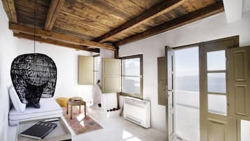 Aurora | Superior Cave Suite with Outdoor Plunge Pool & Caldera View | Living room