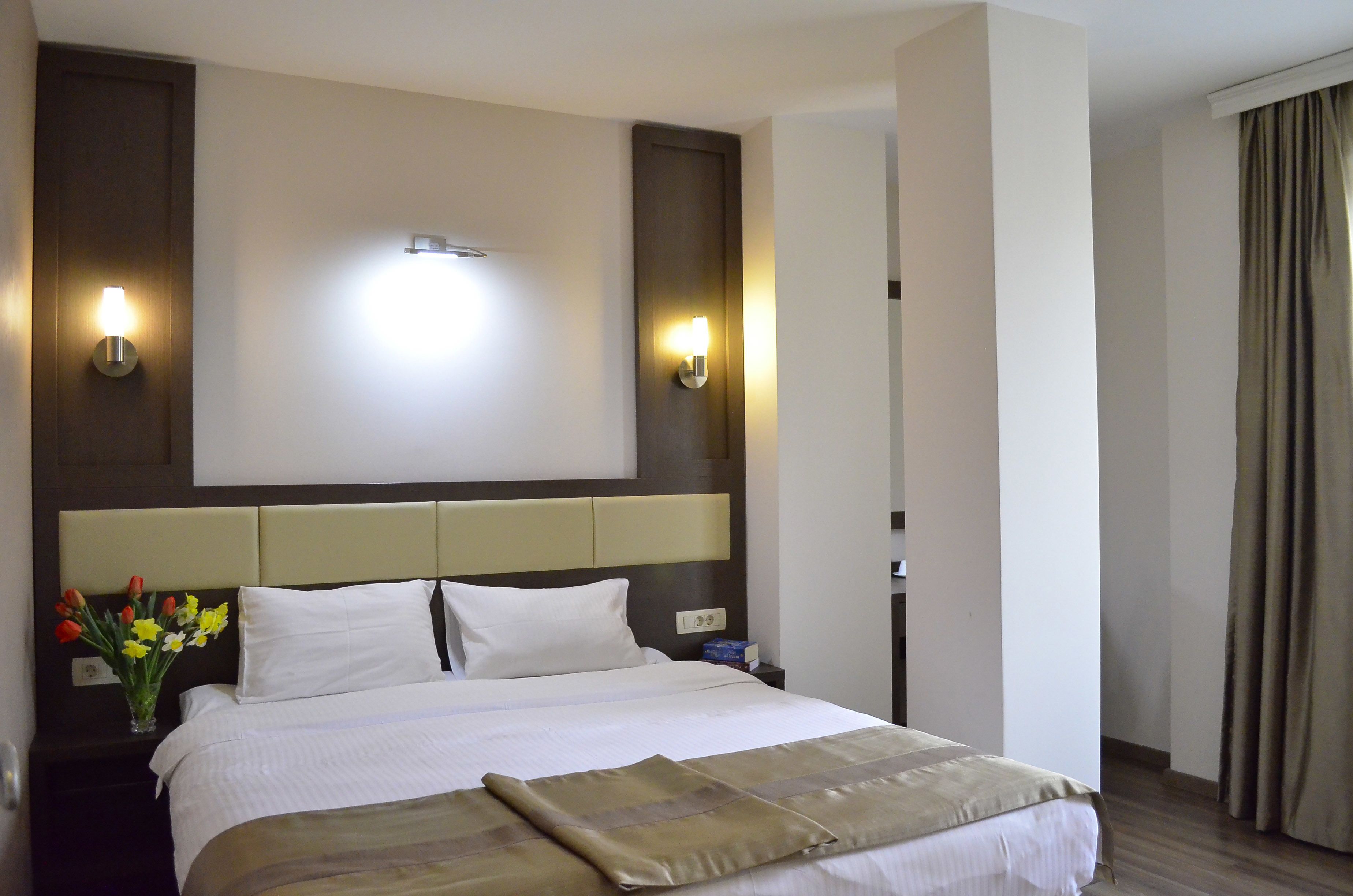 deluxe room, city view | 1 bedroom, premium bedding, minibar, in-room safe