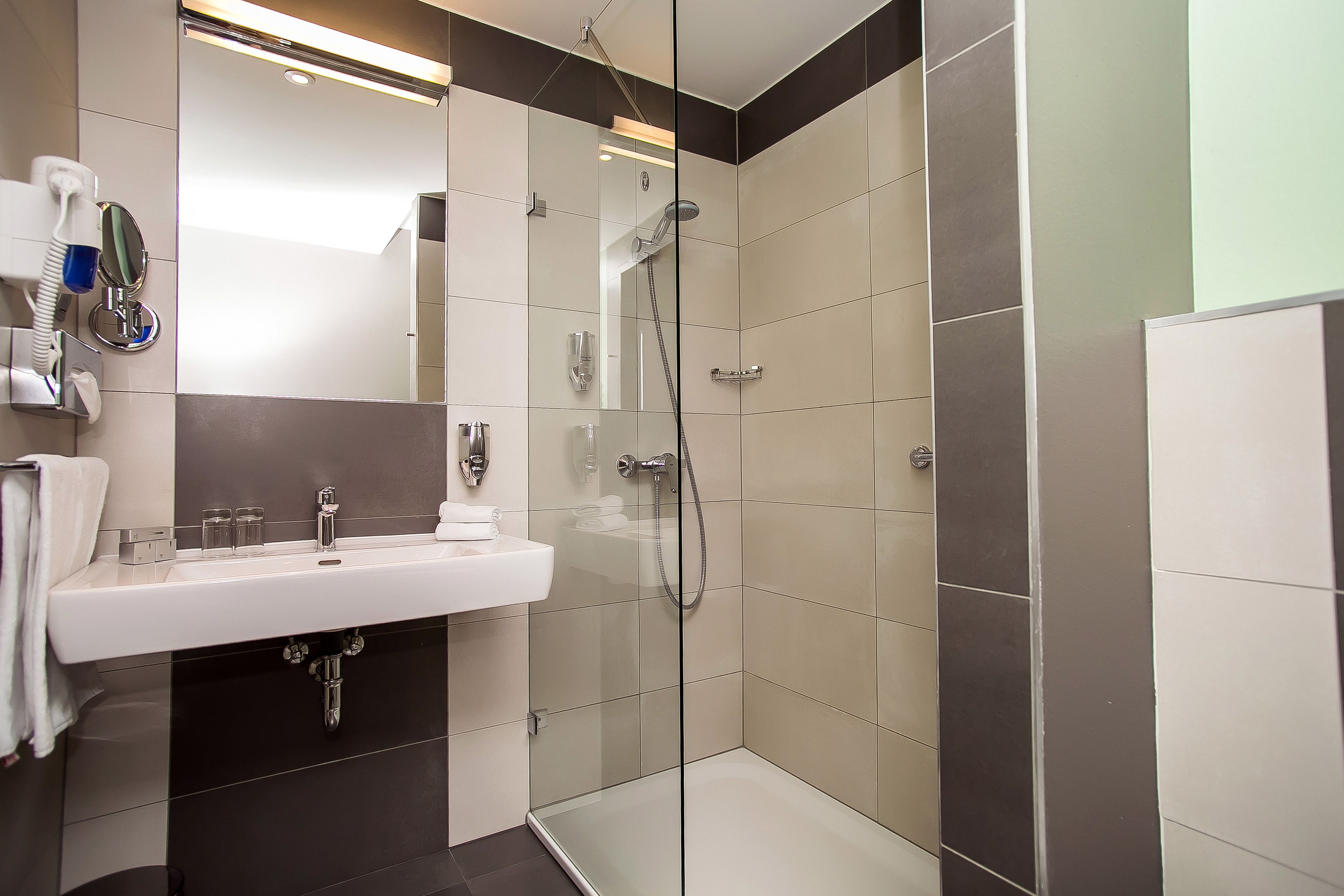 Shower, free toiletries, hair dryer, towels