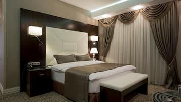 Superior tweepersoonskamer | Luxe beddengoed, een minibar, een kluis op de kamer