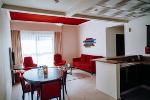 32-inch flat-screen TV with cable/satellite channels, TV