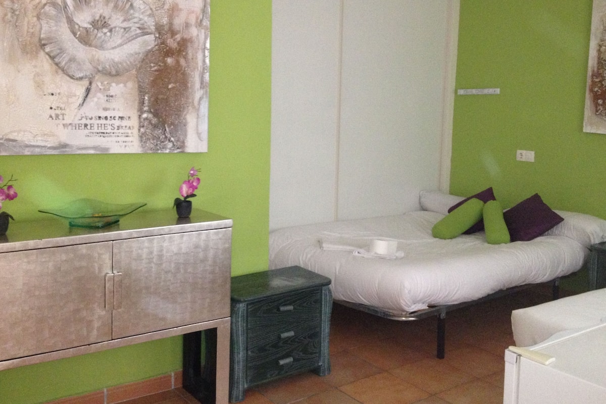Habitación cuádruple | Cunas (de pago) y wifi gratis
