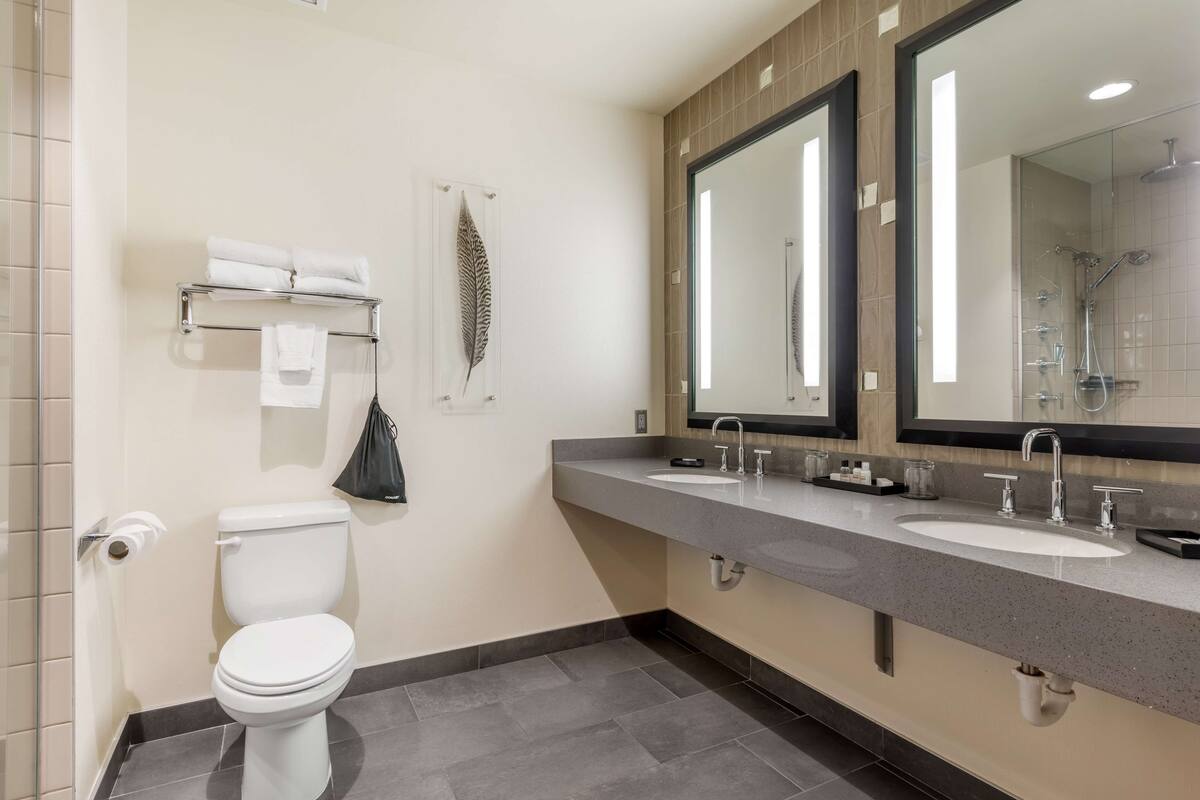 suite, 1 king bed, refrigerator & microwave, garden view | bathroom | designer toiletries, hair dryer, bathrobes, towels
