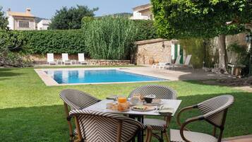 Outdoor pool, pool umbrellas, pool loungers