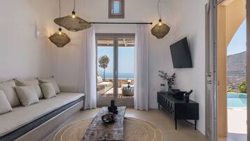 Superior Villa, Private Pool | Living area | 32-inch flat-screen TV with satellite channels, TV, DVD player