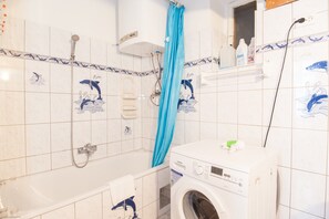 Deluxe Apartment, 2 Bedrooms, City View | Bathroom | Bathtub, designer toiletries, hair dryer, towels