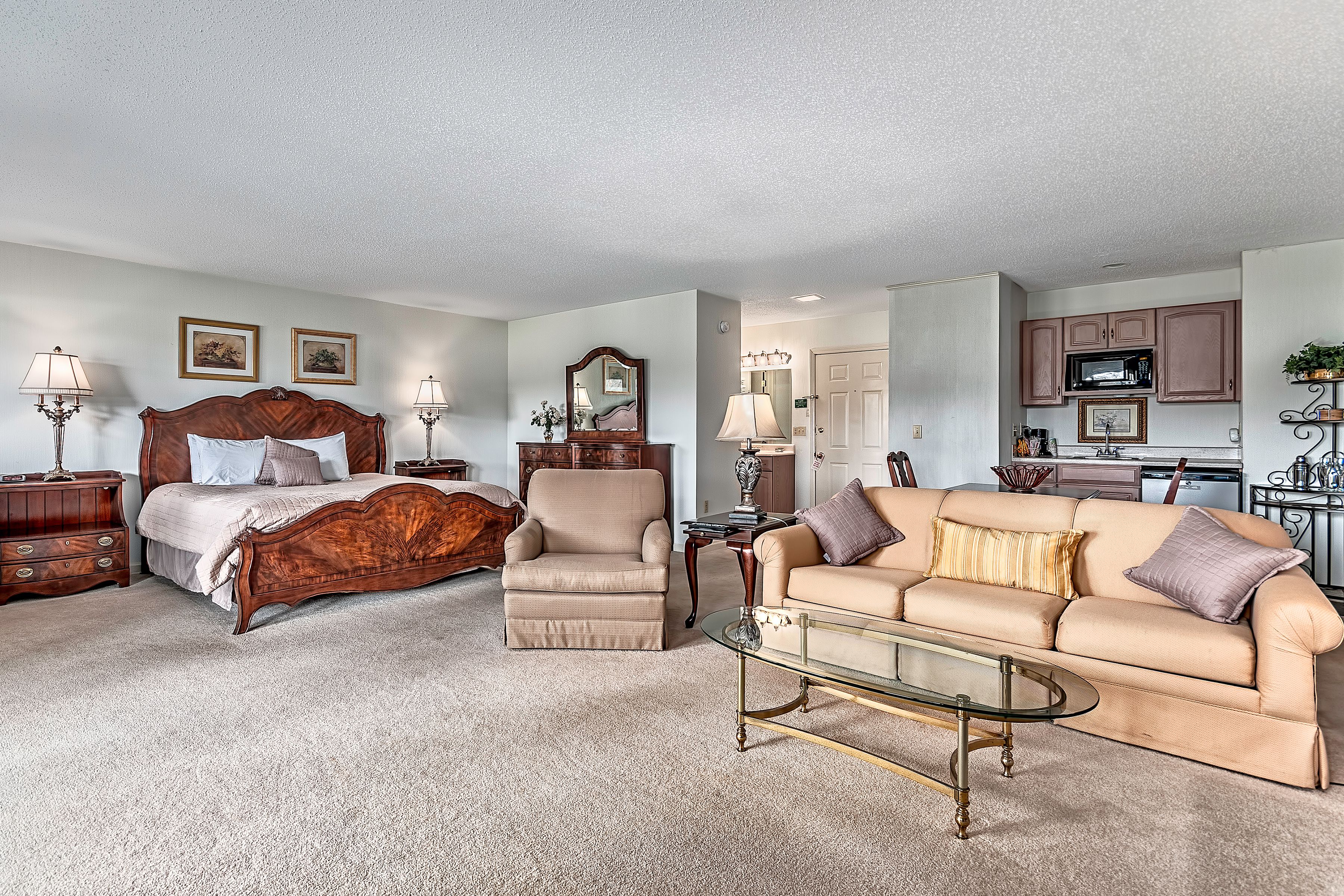 suite, 1 king bed with sofa bed, refrigerator & microwave, golf view | premium bedding, desk, blackout curtains, soundproofing