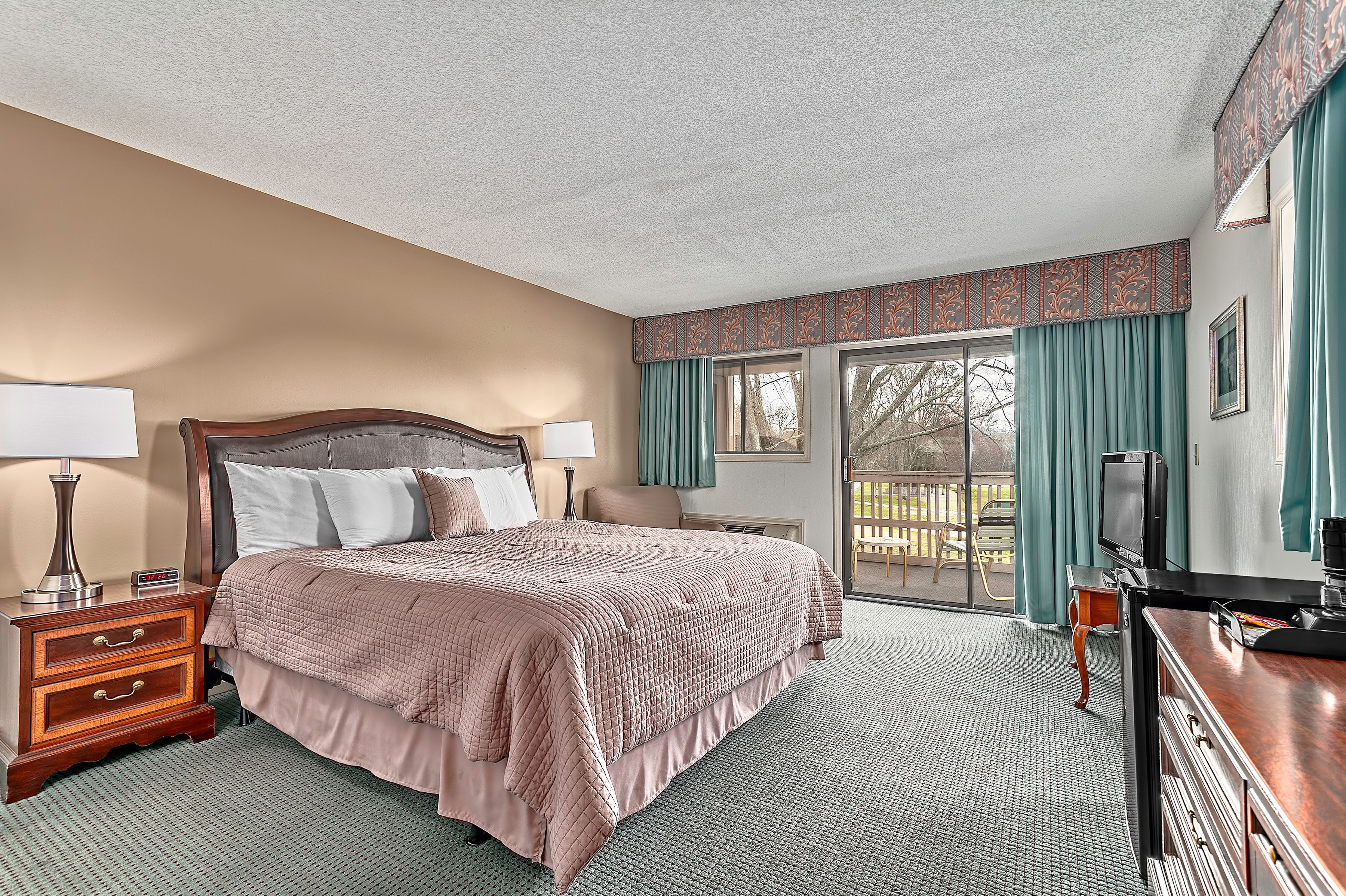 suite, 1 king bed with sofa bed, refrigerator & microwave, golf view | premium bedding, desk, blackout curtains, soundproofing