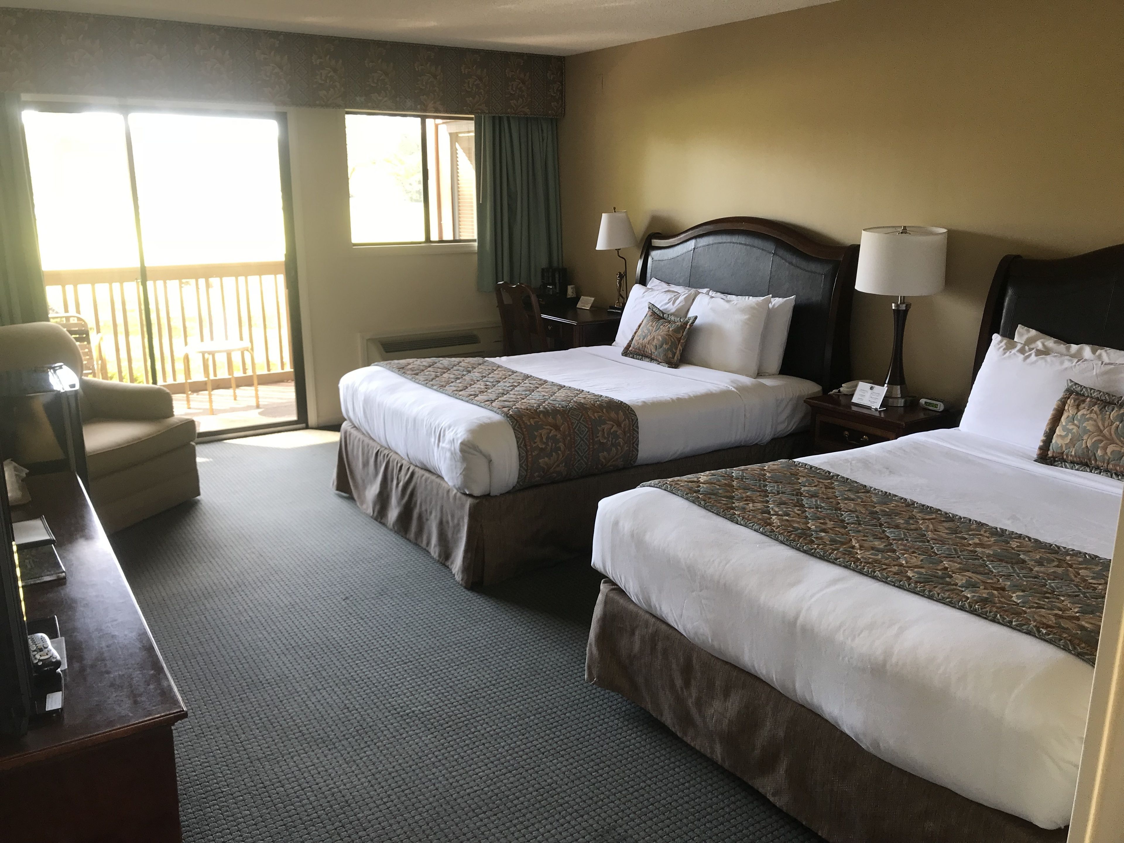 deluxe room, 2 queen beds, balcony, golf view | premium bedding, desk, blackout curtains, soundproofing