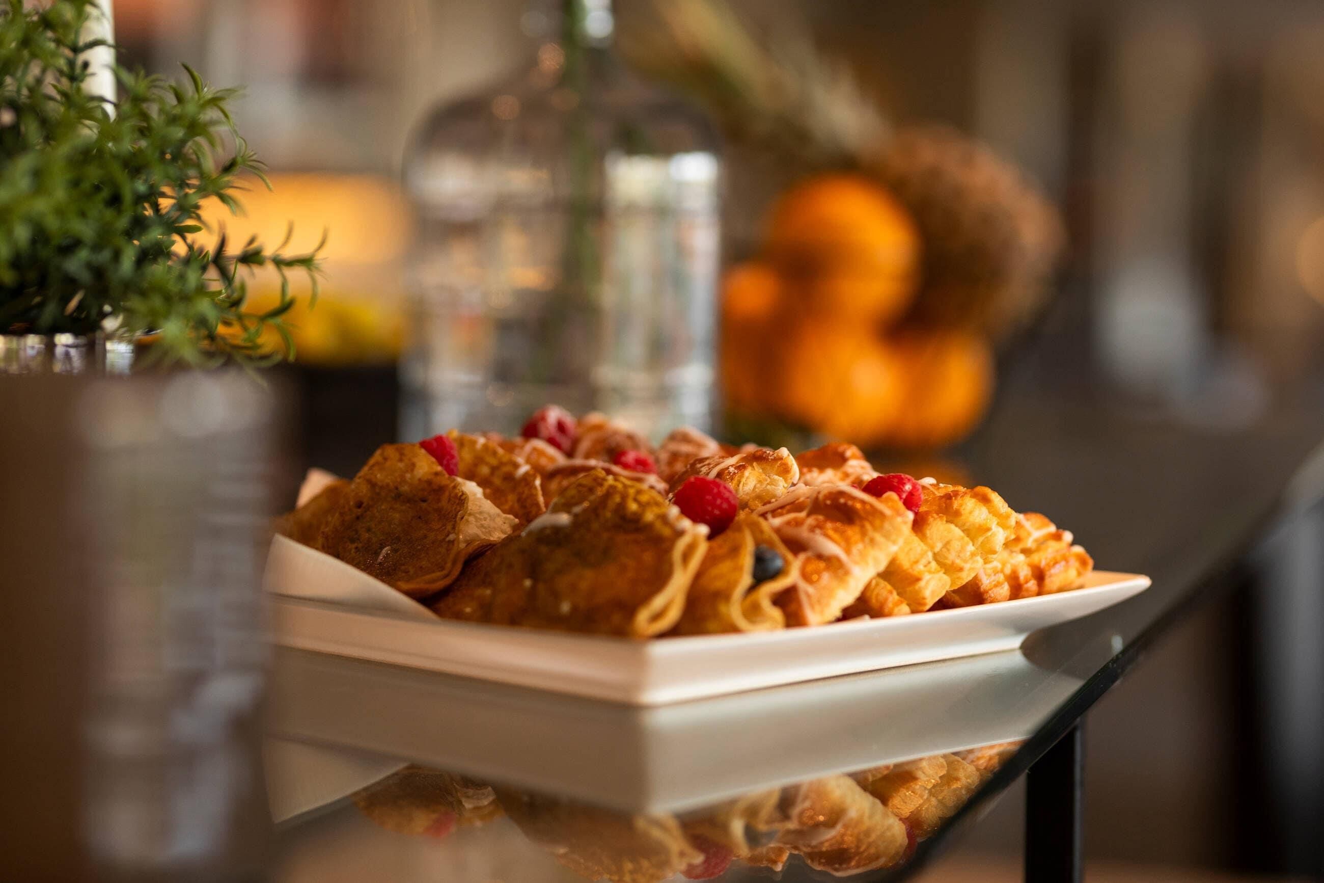 A plate of food on a table with a blurred background.