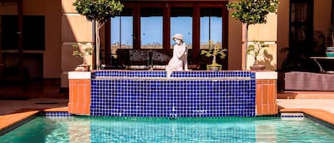 Outdoor pool, sun loungers
