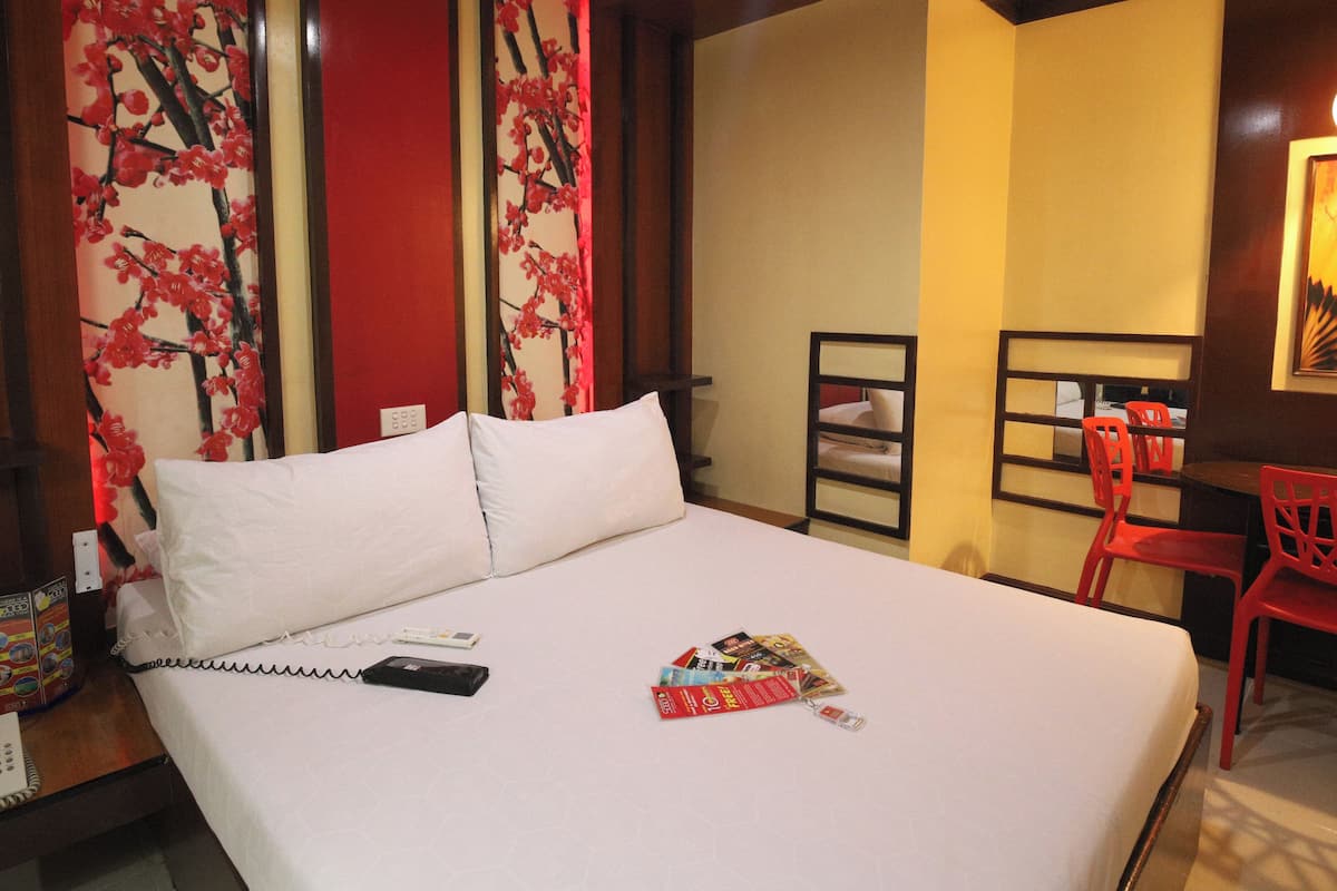 Habitación ejecutiva, 1 cama Queen size | Wifi gratis y ropa de cama