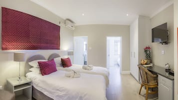 Family Suite, 2 Bedrooms | Premium bedding, in-room safe, individually decorated