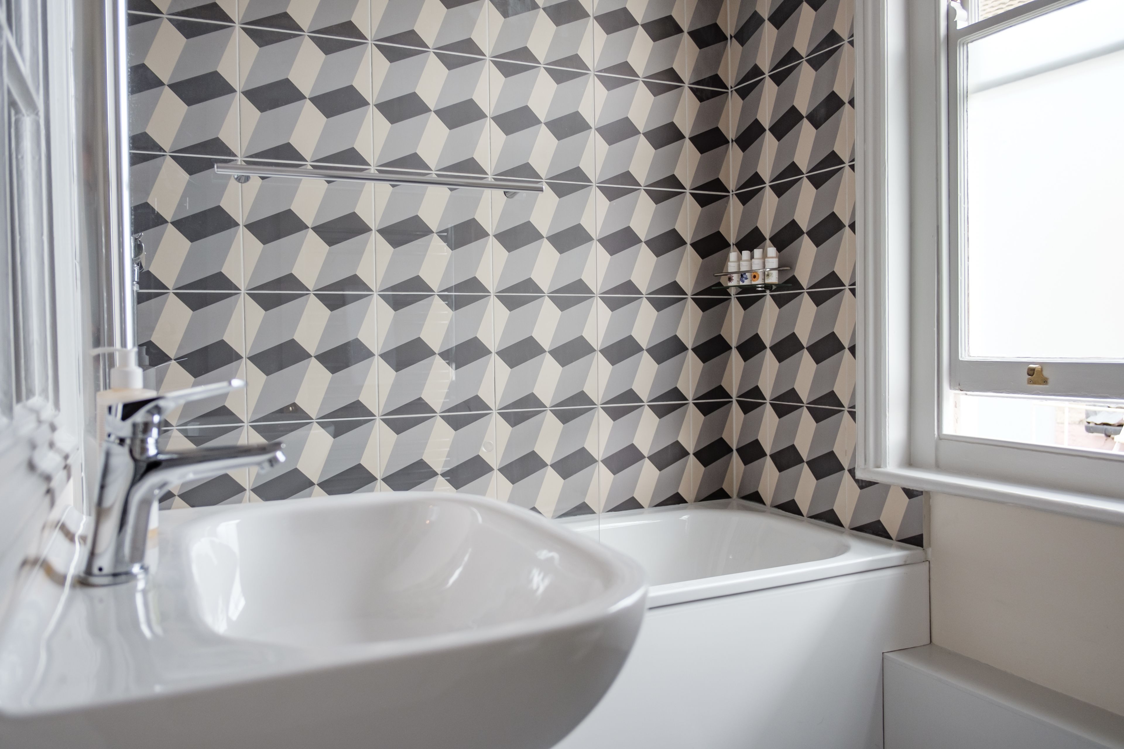 deluxe double room | bathroom | free toiletries, hair dryer, bathrobes, towels