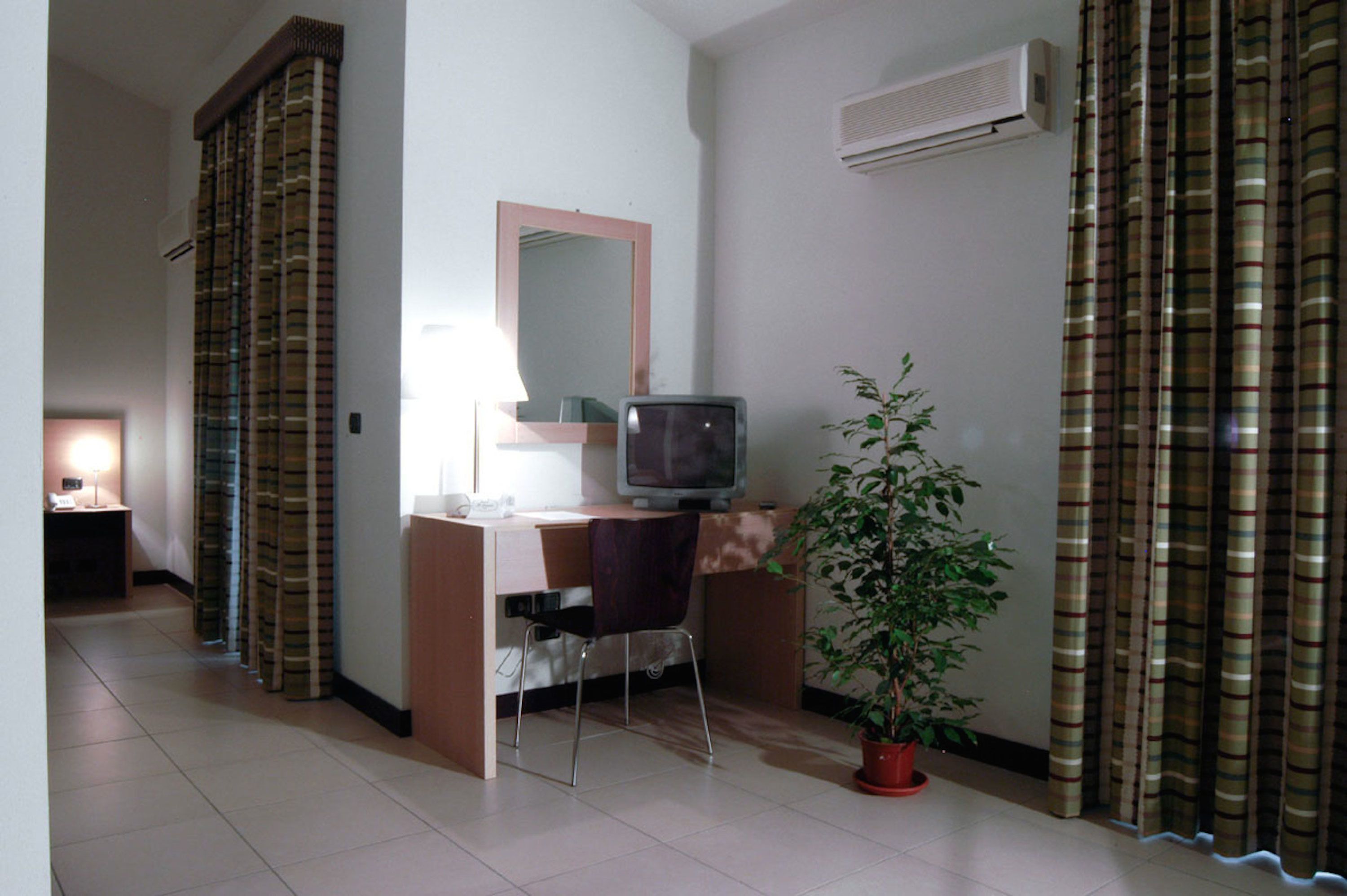 standard double room, 1 double bed | living area | flat-screen tv