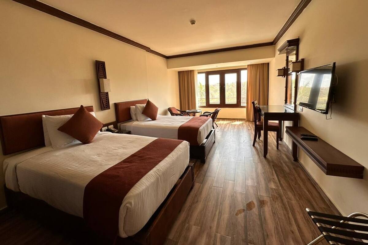 Select Comfort beds, minibar, in-room safe, desk