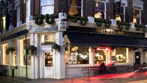 A historic building with ornate architectural details, including decorative moldings and a prominent entrance. - The Clerk & Well Pub & Rooms (London)