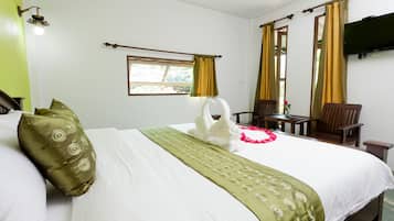 Habitación estándar, 1 cama King size, para no fumadores, vista al jardín | Caja de seguridad en la habitación y decoración personalizada