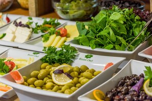Fresh produce and Mediterranean-inspired dishes are offered in the hotel's dining area.