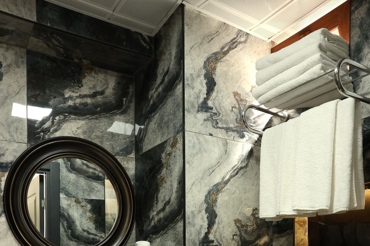 Family Room, Multiple Beds | Bathroom | Shower, free toiletries, hair dryer, slippers