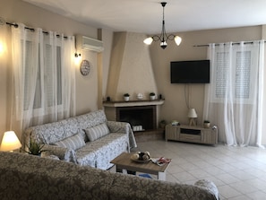 Villa, 2 Bedrooms | Living area | Flat-screen TV, DVD player