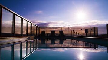 Outdoor pool, open 8 AM to 10 PM, sun loungers