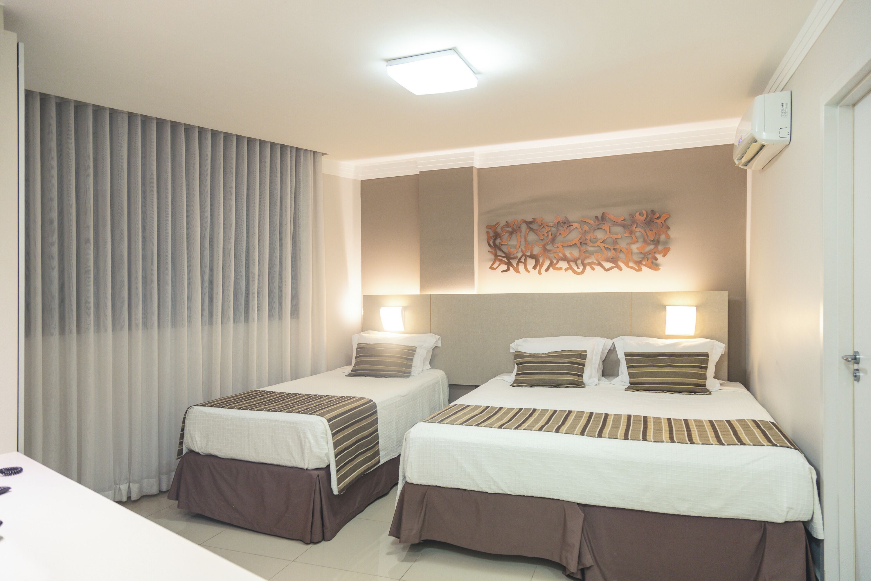 triplo casal familia | 1 bedroom, minibar, in-room safe, desk