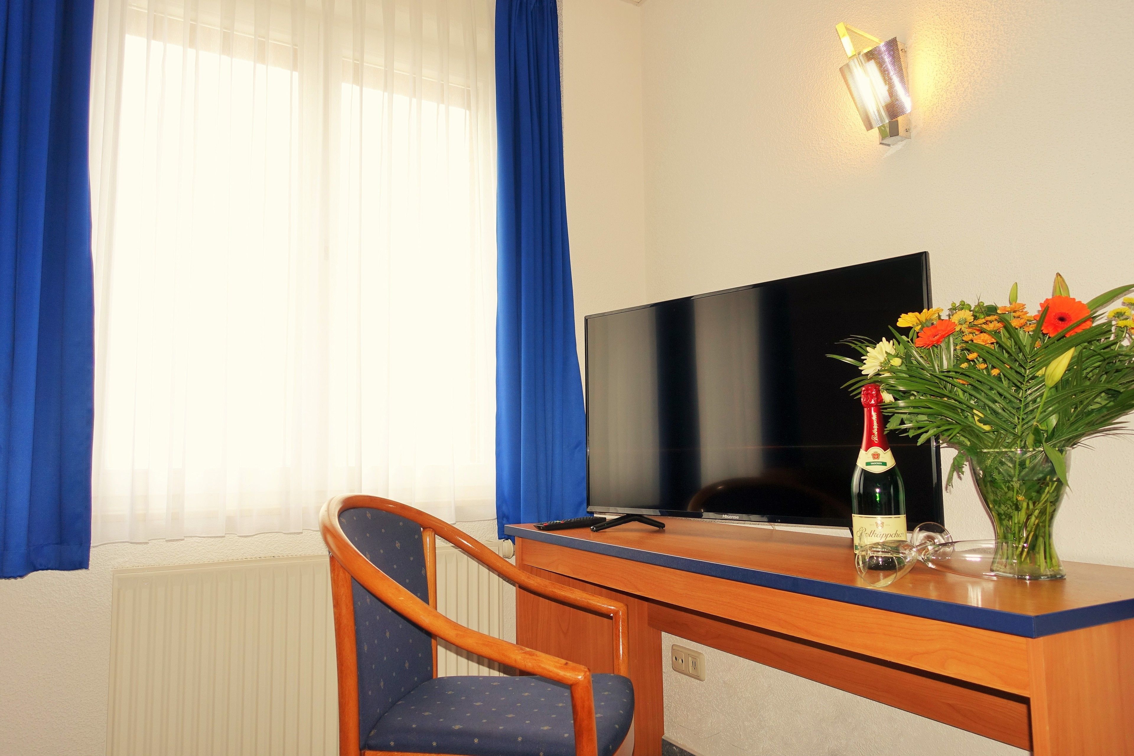 suite | living room | 32-inch flat-screen tv with satellite channels, tv