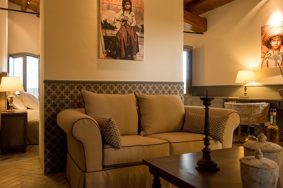 Panorama suite, terras, uitzicht op tuin | 1 slaapkamer, luxe beddengoed, een minibar, een kluis op de kamer