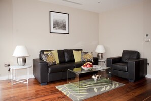 Appartamento Executive, 1 camera da letto | Area soggiorno | TV a schermo piatto