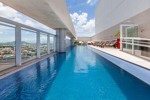 Outdoor pool, open 8:00 AM to 10:00 PM, pool loungers