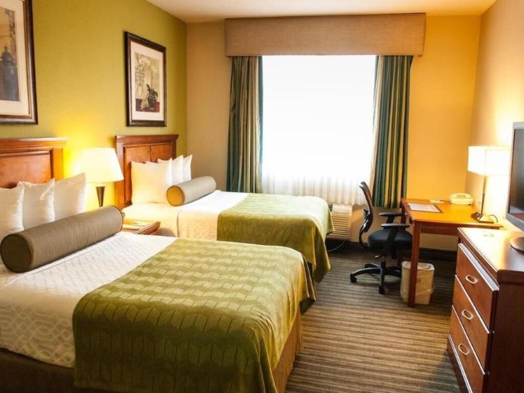 Pillow-top beds, blackout curtains, iron/ironing board, free WiFi