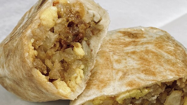 A burrito cut in half, revealing its fillings. - Cripple Creek Hospitality House (Cripple Creek)