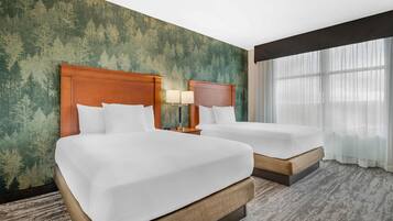 Desk, blackout drapes, iron/ironing board, free cribs/infant beds