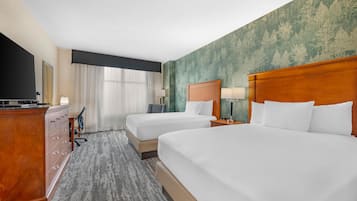 Desk, blackout drapes, iron/ironing board, free cribs/infant beds